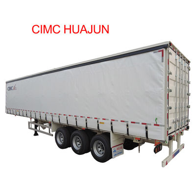 CIMC HUAJUN 트레일러 커튼 텐셔너 3 축 40 피트 드롭 데크 건조 화물 운송